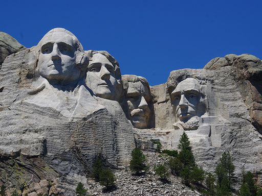 Mount Rushmore featuring presidential faces.